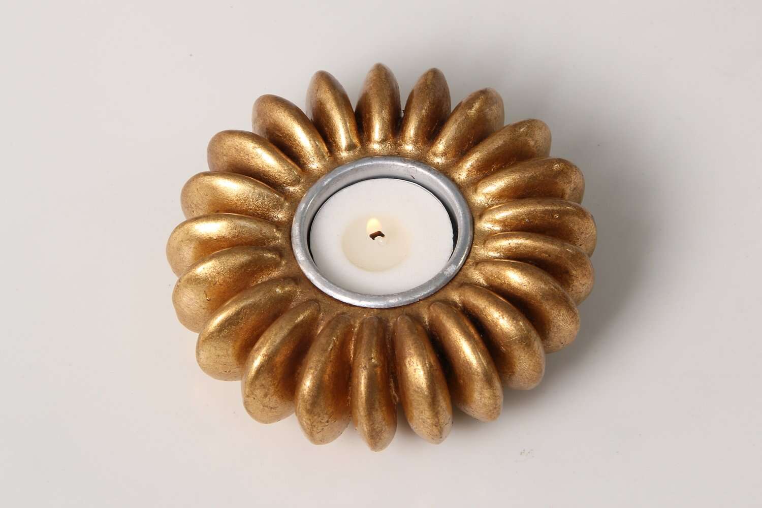 Tea light holder cast from a sandbox seed pod in resin, gold finish, 12 x 12 cm for table or kitchen