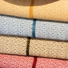 Recycled cotton tablecloth with a coloured stripe and short fringe, made in Portugal, machine washable
