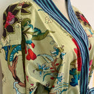 Block-printed cotton robe with a tropical flower print in light blue or green, contrast trim, one size