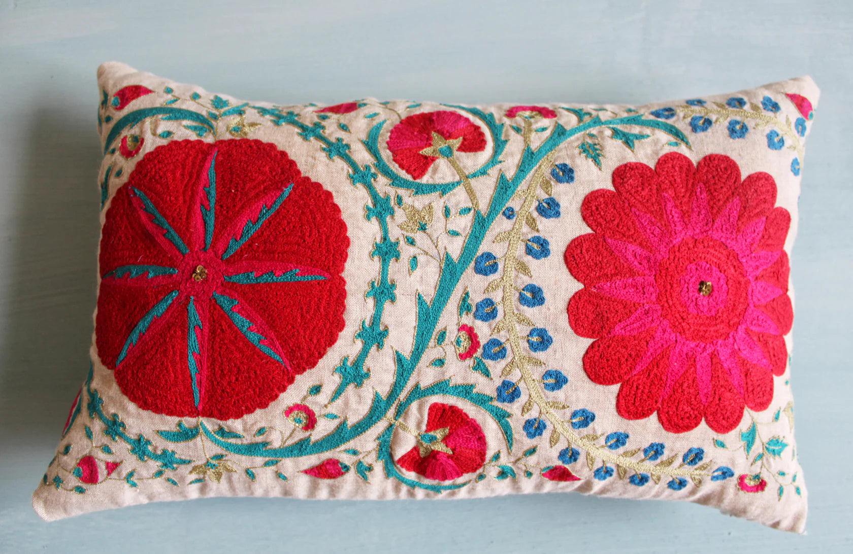 Suzani Linen Cushion Fergana, part of the Chair & Sofa Cushions collection at Inside Living Singapore, side view.