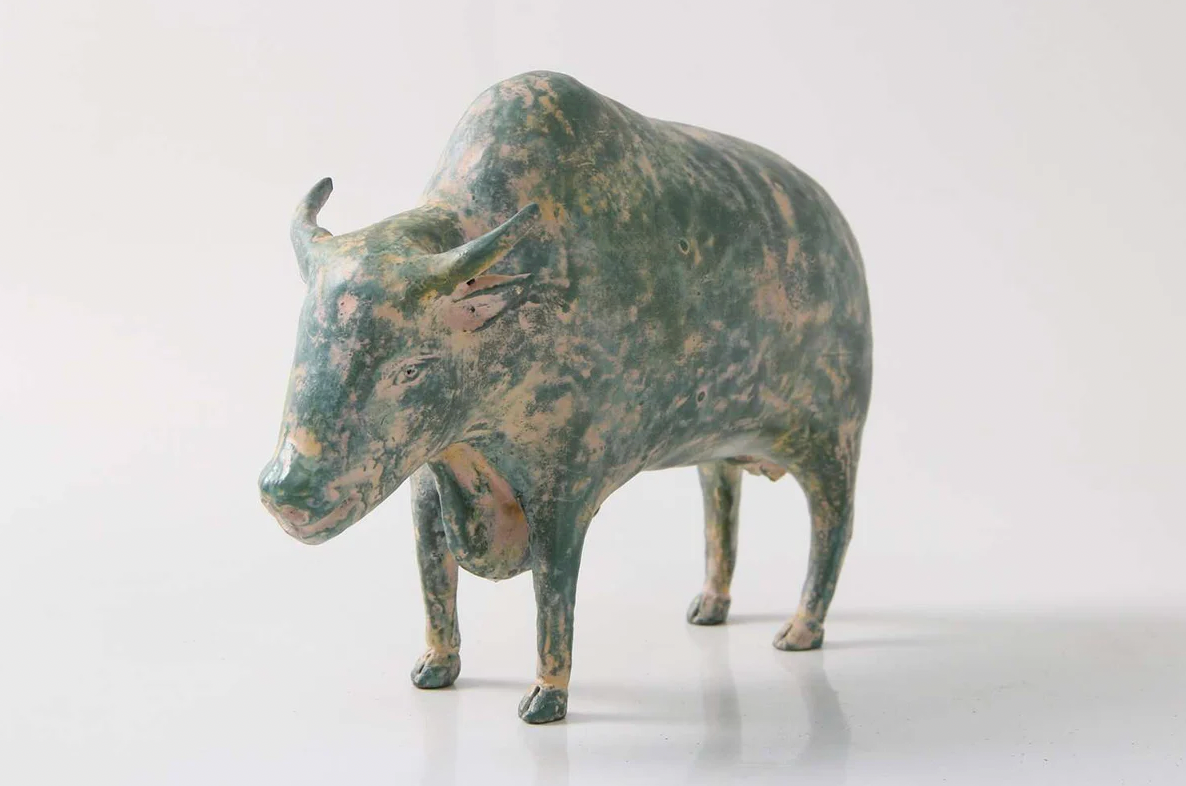 Hand-painted resin water buffalo sculpture with a verdigris patina, 20 x 5 x 14.5 cm