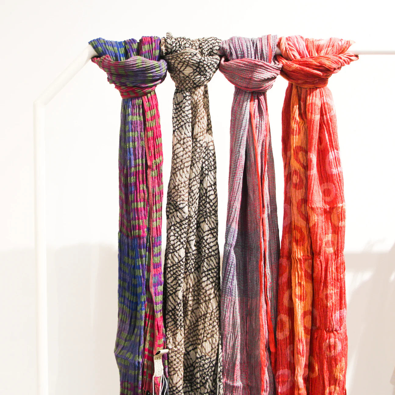 Handwoven Silk Scarf Stripes Multi, styled in a room setting, from the Inside Living Singapore homeware collection.