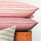 Striped pink cushion, decorative scatter cushion with a pink stripe design, a bright accent for sofa or bed.