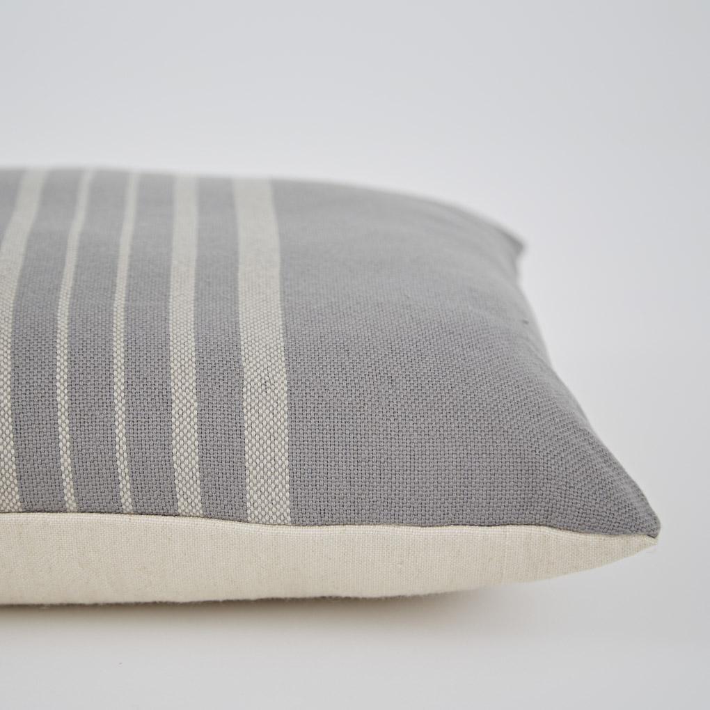 Grey and linen Antibes cushion detail, patterned cushion in grey and linen adding a neutral accent to seating.