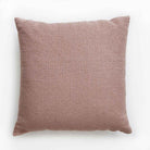 Coral diamond cushion, scatter cushion with a geometric diamond pattern in coral, warm decorative sofa accent.