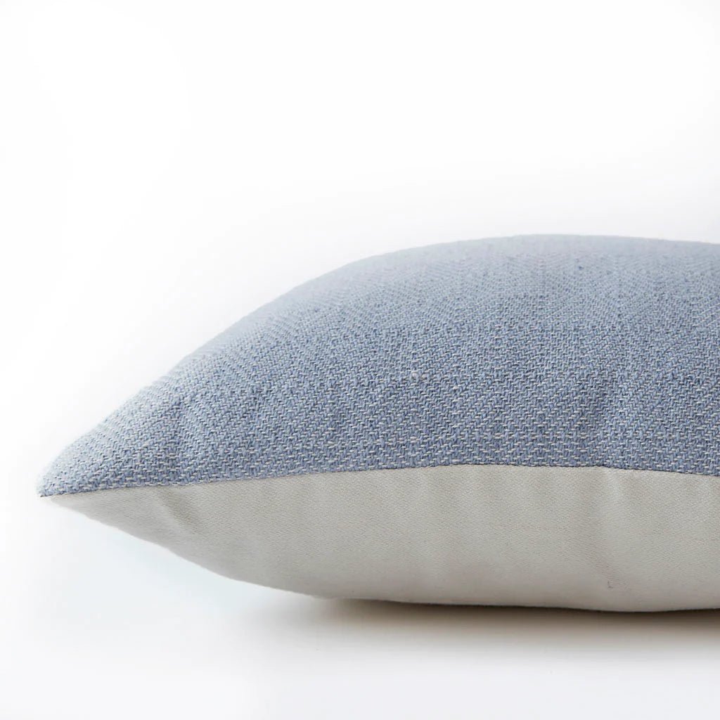 Lavender diamond cushion detail, geometric patterned cushion in lavender adding a gentle accent to seating.