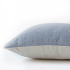 Lavender diamond cushion detail, geometric patterned cushion in lavender adding a gentle accent to seating.