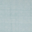 Teal diamond blanket detail, woven geometric throw in teal adding cosy texture and colour to seating.