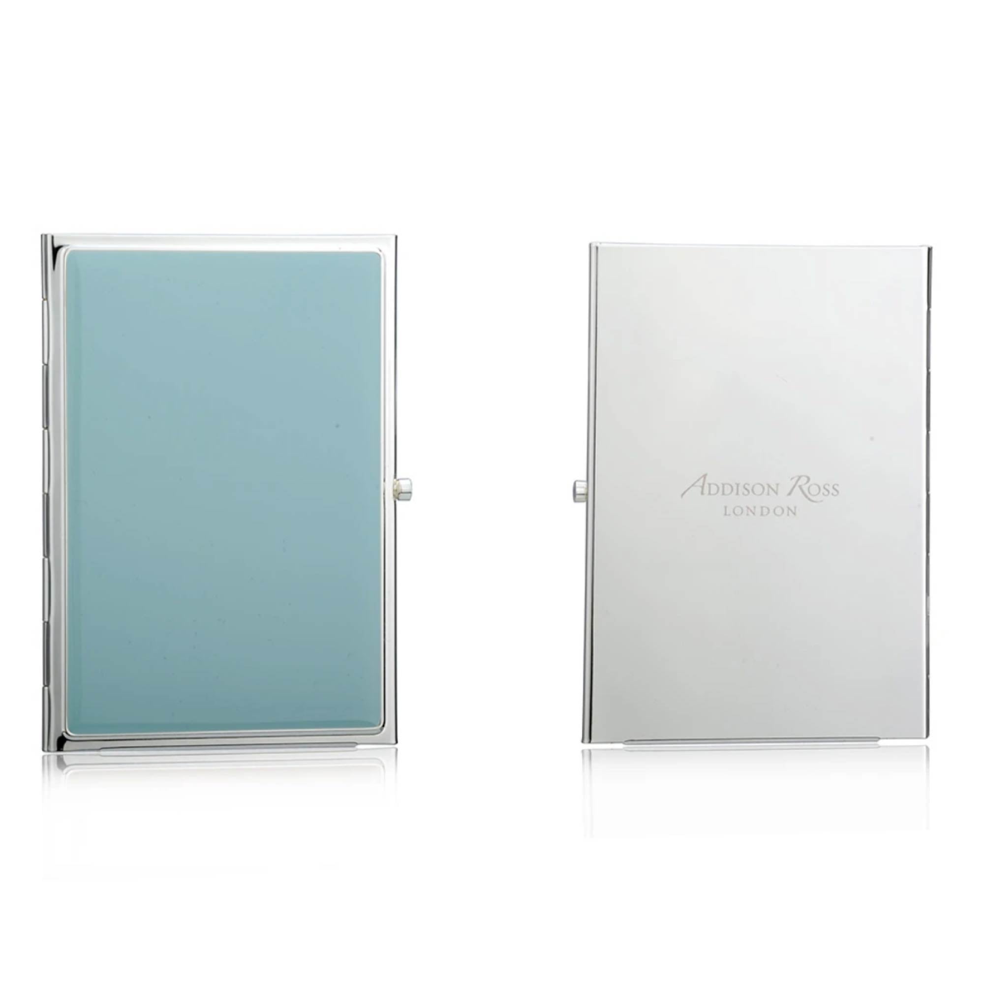 Silver-plate travel photo frame in pastel blue enamel, holds two 2 x 3 inch portrait photos