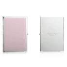 Silver-plate travel photo frame in pastel pink enamel, holds two 2 x 3 inch portrait photos