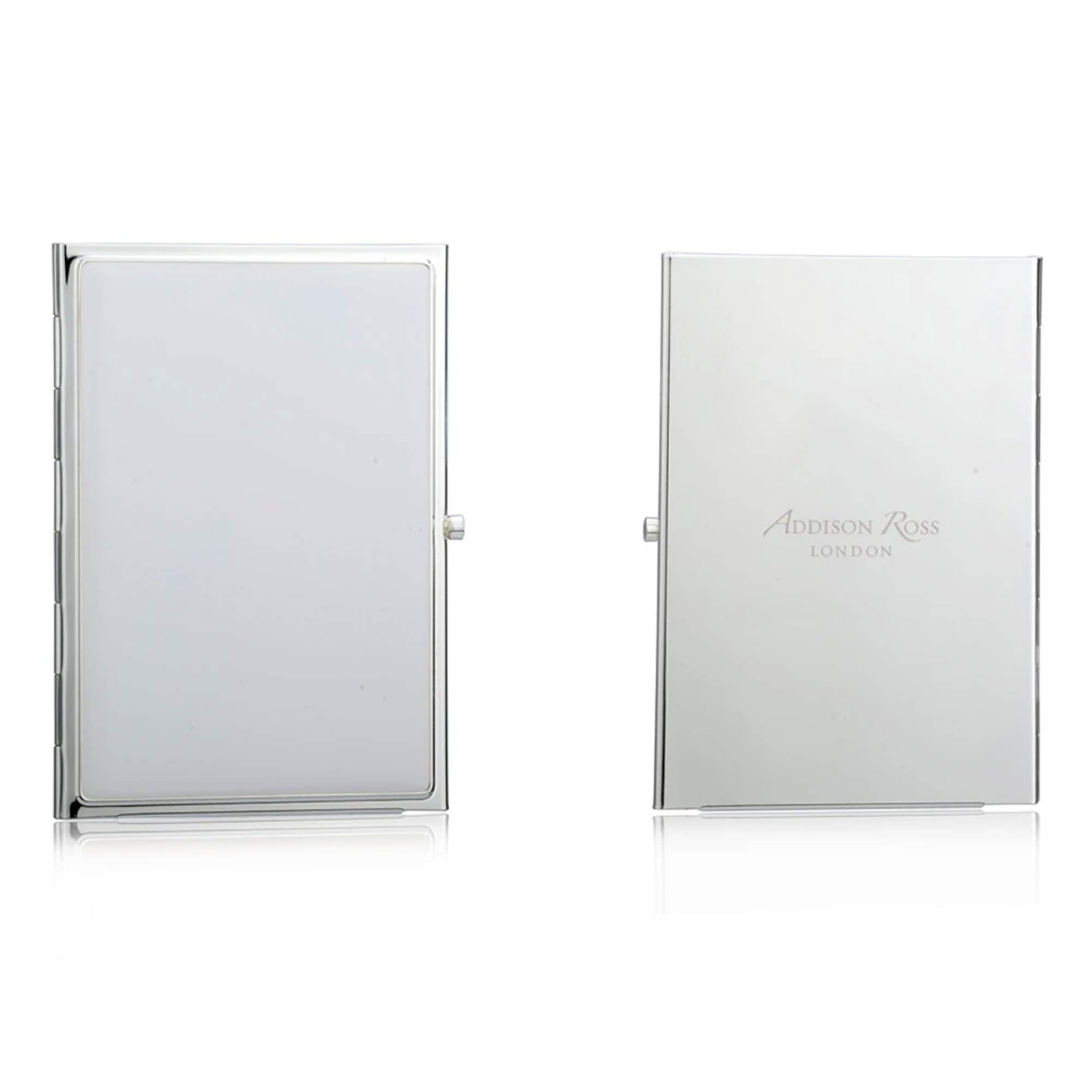 Silver-plate travel photo frame in white enamel, holds two 2 x 3 inch portrait photos