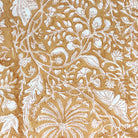 Yellow cotton tablecloth in the Rainforest block print with a striped border, machine washable