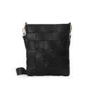 Braided strap bag black detail, woven handbag with a braided strap, a versatile accessory for day or evening.