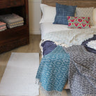 Cotton Cushion Portuguese Mosaic, shown in context, from the Inside Living Singapore homeware collection.