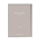 Fine silver-plated photo frame with black velvet back, holds 4 x 6 or 5 x 7 inch photos