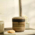 Orbis small mango wood storage jar with lid, handcrafted kitchen canister, from Inside Living Singapore Front view.