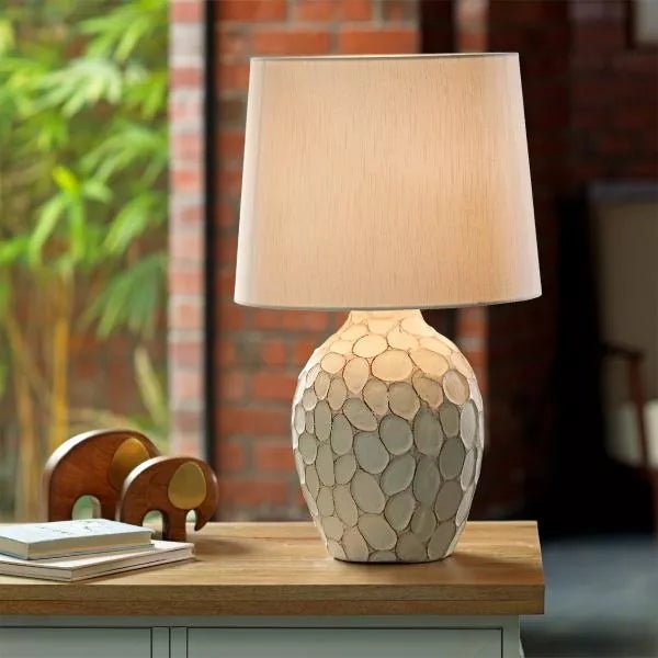 Pebble pot table lamp with fabric shade in Ecomix finish, textured ceramic base for warm ambient home lighting.