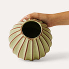 Sthal Salon round vase in avocado, ribbed high-fired terracotta, 16 cm diameter and 11 cm high, detail view