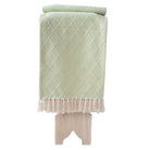 Cotton Throw Portuguese Mosaic, shown in context, from the Inside Living Singapore homeware collection.
